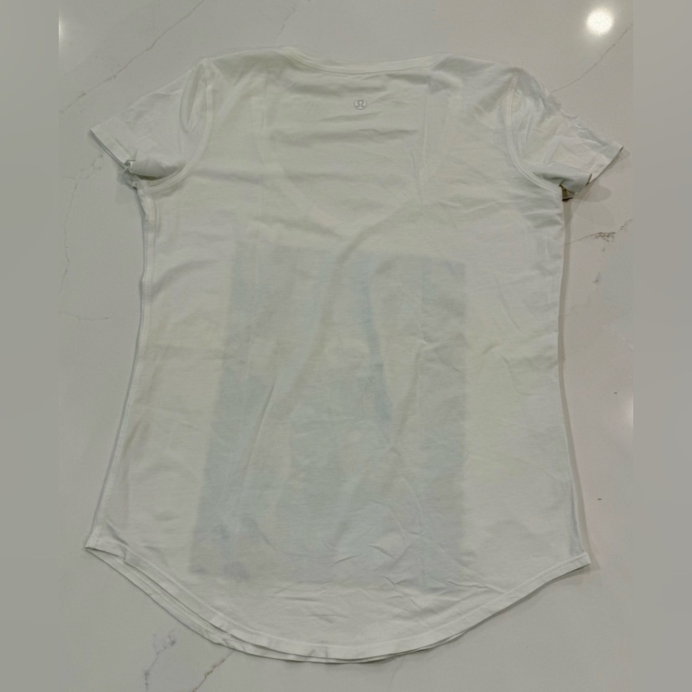 Lululemon short sleeve white t shirt with Aldous Collins art v neck local - Picture 5 of 6